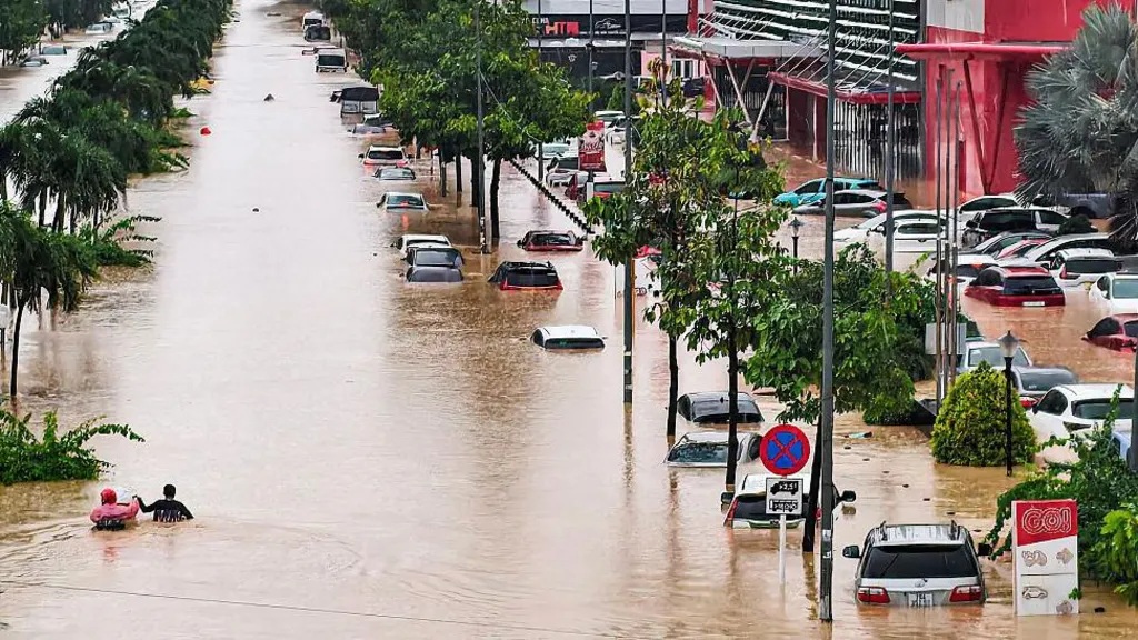 The deluge has submerged more than 52,000 homes and left half a million households and businesses without power